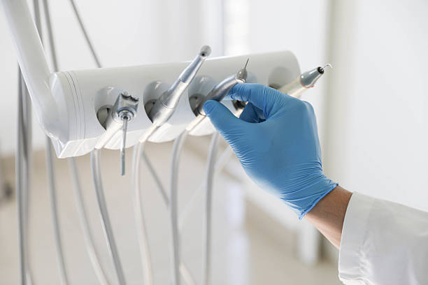 Professional Tooth Extraction technician working in Hanscom AFB, MA